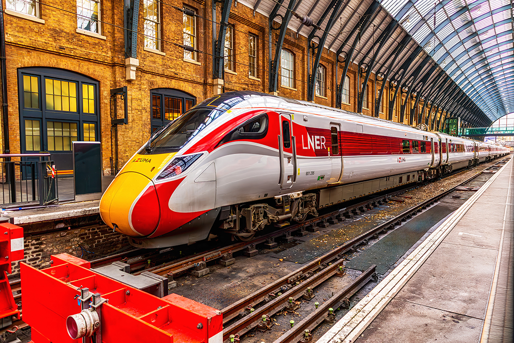 Where history meets velocity: the sleek LNER Azuma glides into King’s Cross, weaving modern motion through London’s timeless architecture. London, England