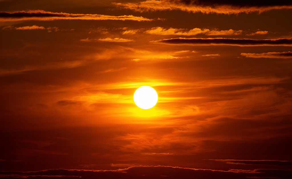Golden hues paint the sky as the day fades into a quiet, mesmerizing sunset. Britannia, Ottawa, Ontario
